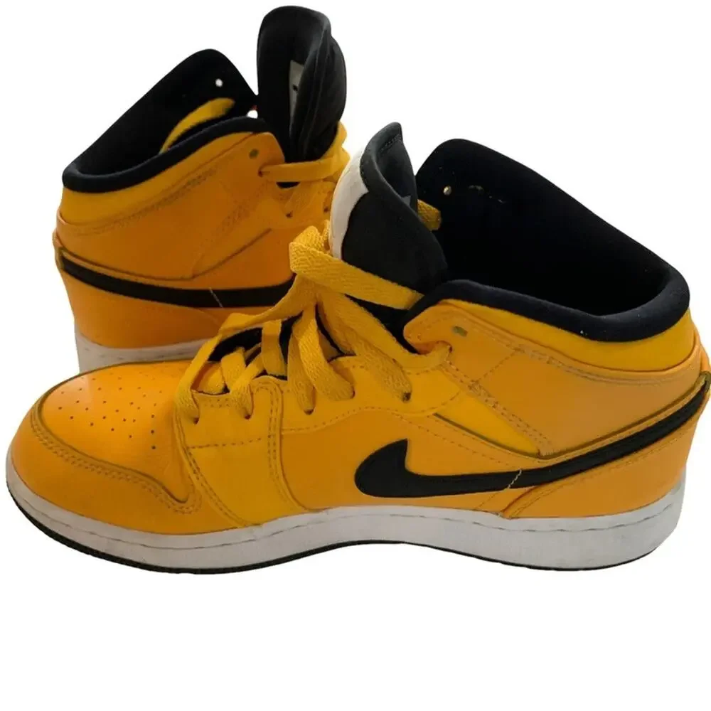 Nike air Jordan 1 mid university gold.‎ Size 4.5Y